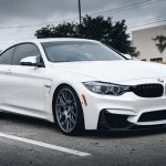 white bmw m 3 coupe on road during daytime