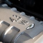 Close-up of a silver engine with "4.3 v8" inscription.