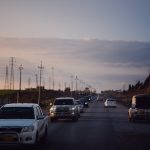 a bunch of cars that are sitting in the street