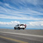 white SUV under blue sky