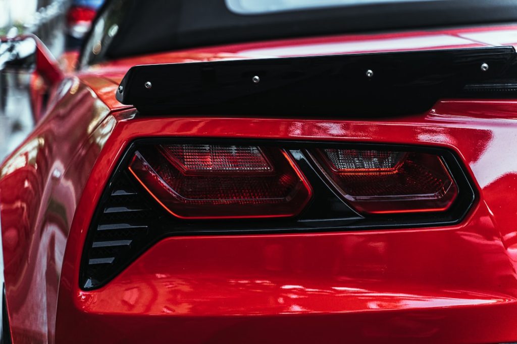 red and silver car in tilt shift lens