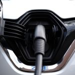 a close up of a car's fuel nozzle