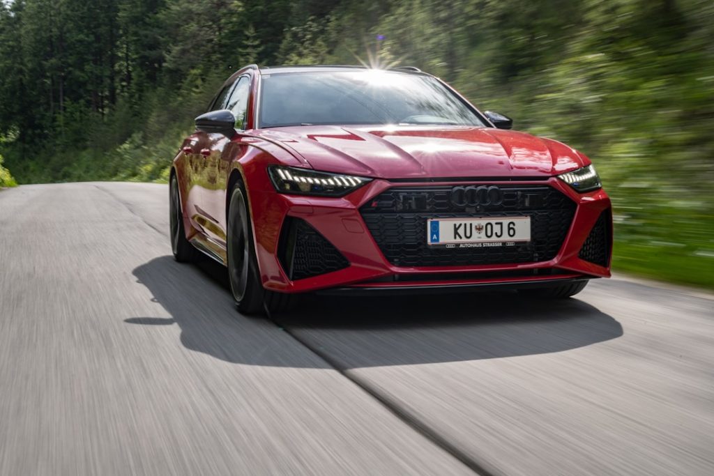 a red sports car on a road